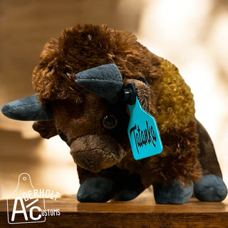 Cute buffalo plushie with custom cattle ear tag